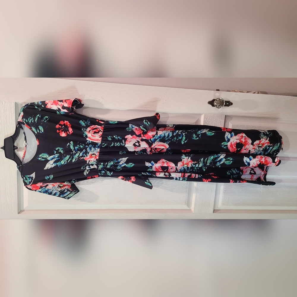 A blue floral summer dress, size L.